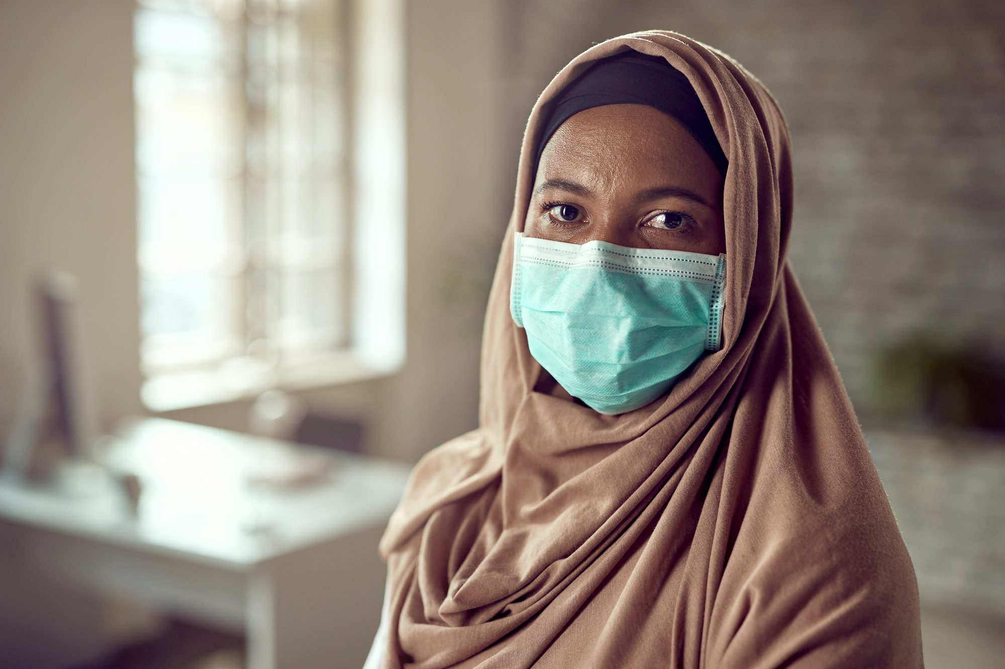 A doctor in an unhurried, respectful consultation