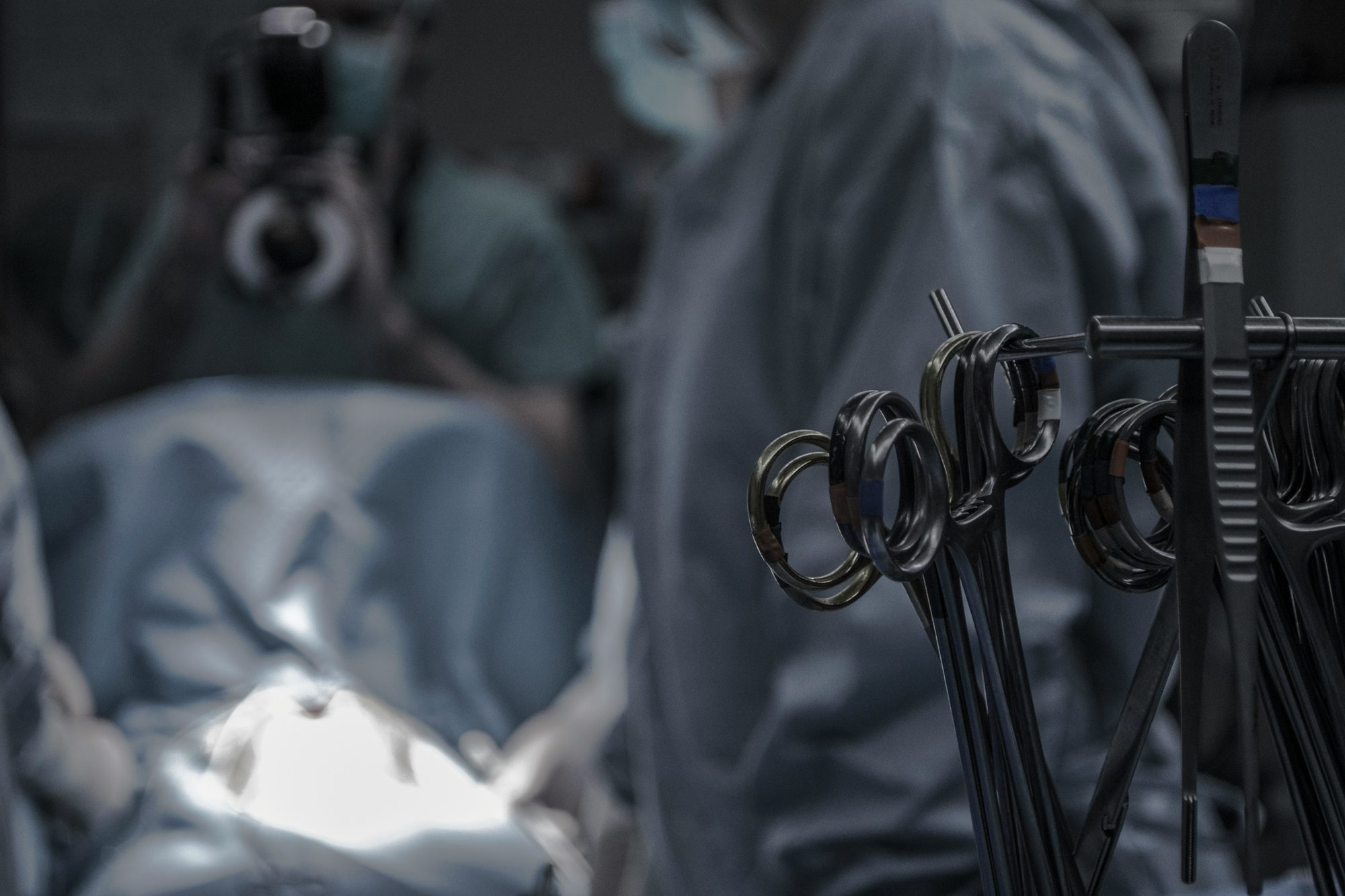 Specialists in a modern operating theatre
